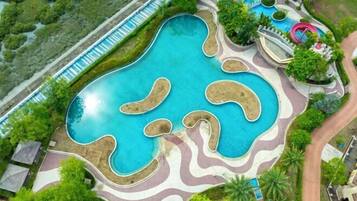 Outdoor pool, open 9:00 AM to 8:00 PM, pool umbrellas, pool loungers