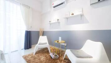 House (Yellow) | Living area | 32-inch LED TV with satellite channels, TV