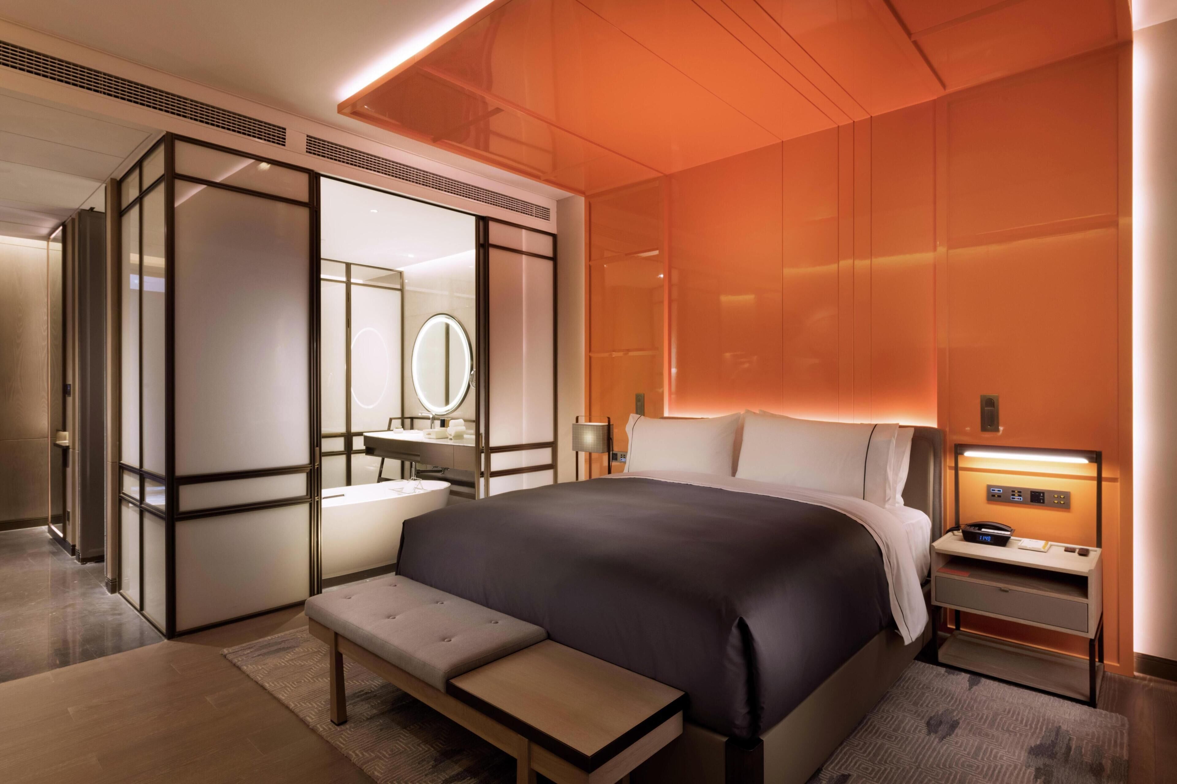 King Canopy Room  | Down comforters, memory foam beds, minibar, in-room safe