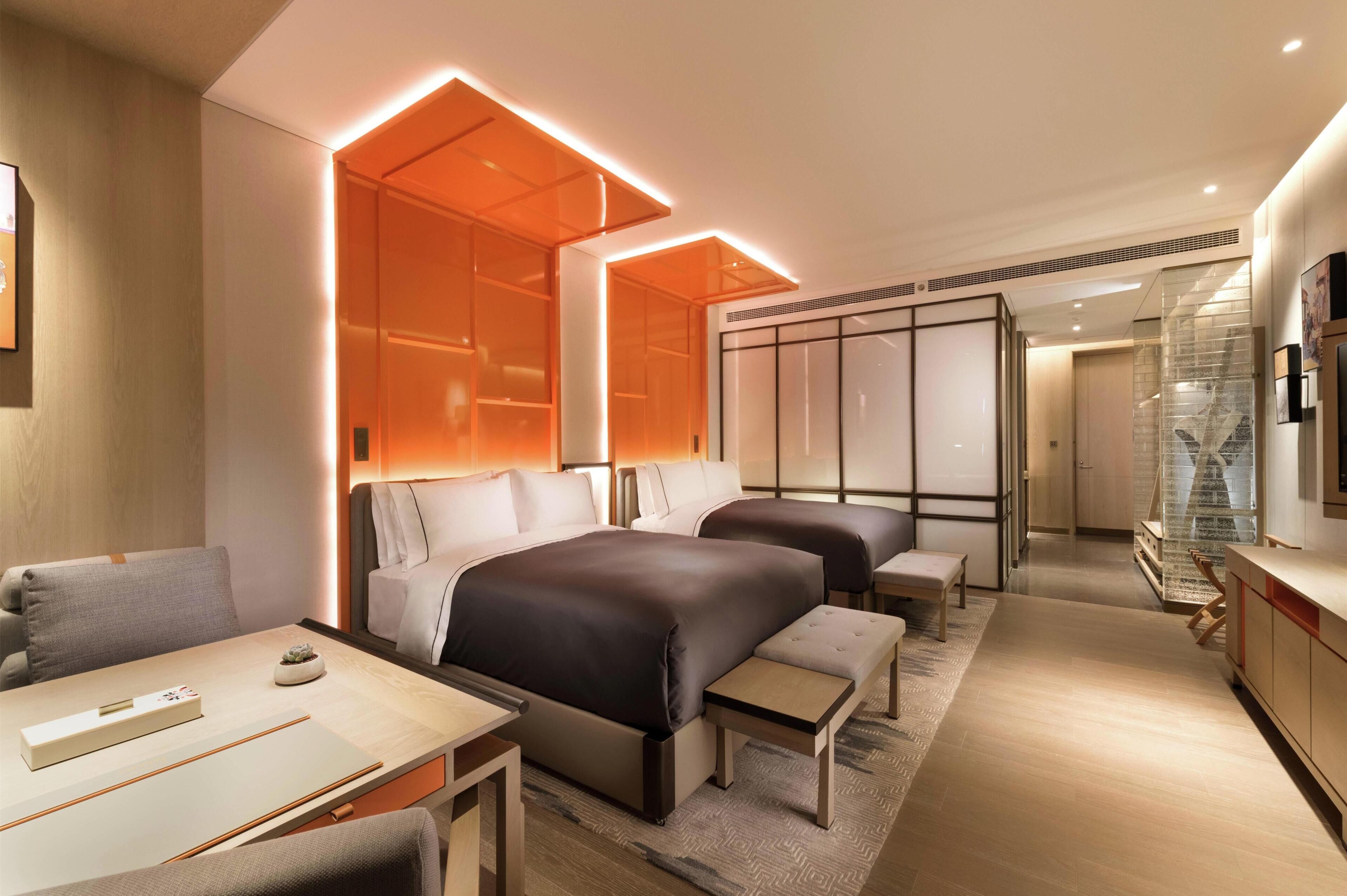 Down duvets, memory-foam beds, minibar, in-room safe
