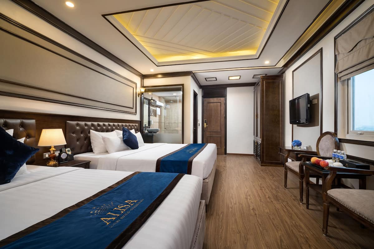 Luxe beddengoed, een minibar, een kluis op de kamer, een bureau