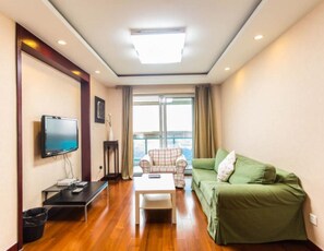 Apartamento, 2 camas dobles, no fumadores | Zona de estar | Una televisión