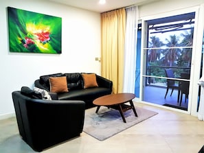 Two Bedrooms Apartment  | Living area | Flat-screen TV