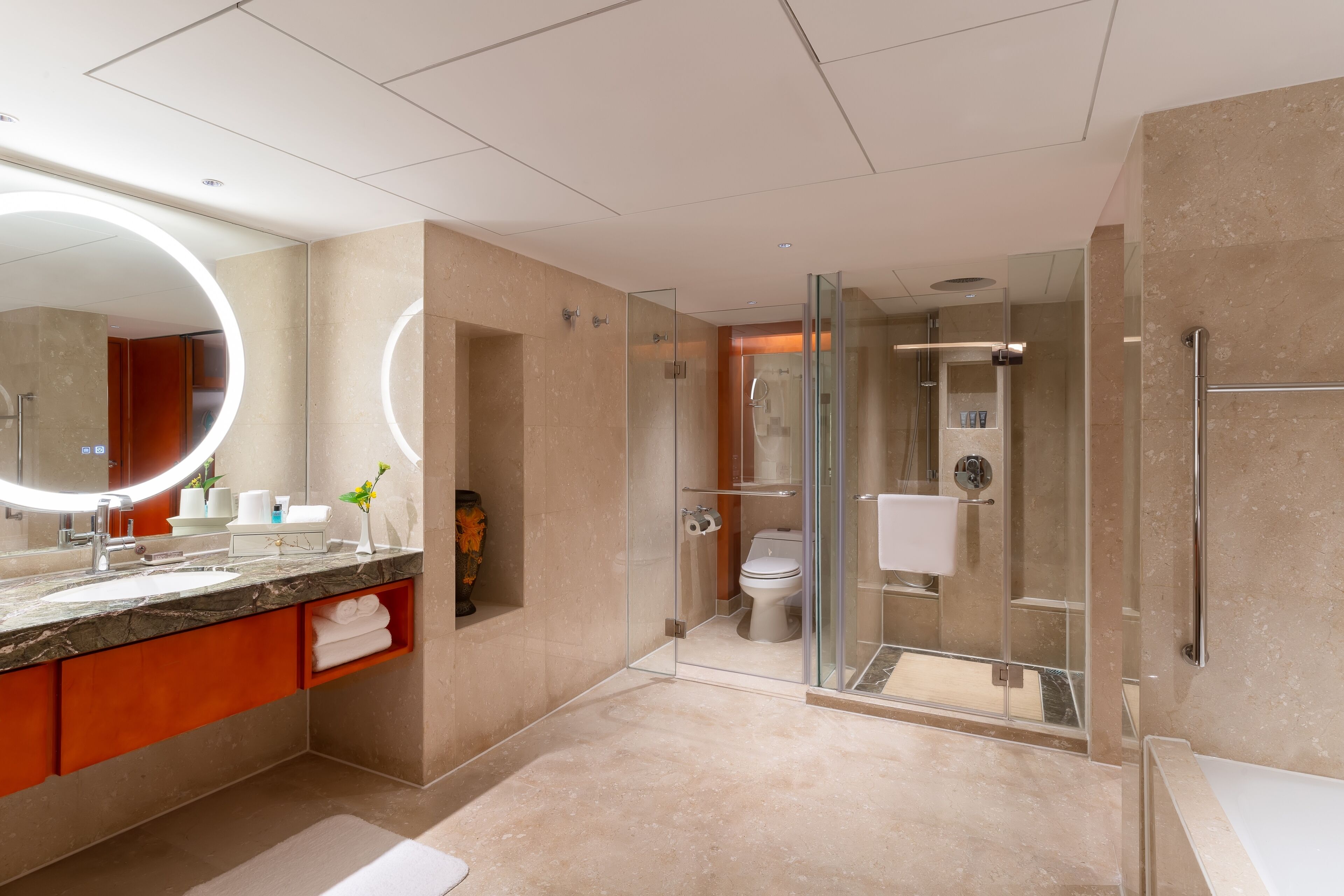executive suite | bathroom | separate bathtub and shower, rainfall showerhead, free toiletries