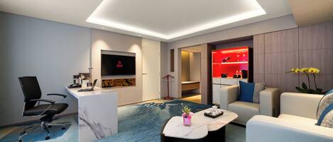 A modern hotel room with a marble reception desk, a flat-screen TV, a seating area with a sofa and armchairs, a small coffee table, and a red-lit minibar.