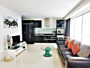 Exclusive Apartment, 2 Bedrooms, Sea View | Living area | Flat-screen TV
