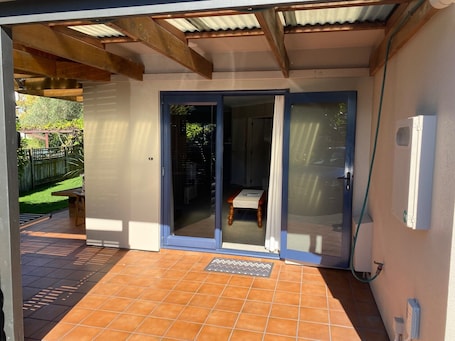 Terrace/patio. Very private 1 bedroom modern flat bordering reserve in very quite cul-de-sac