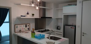 Apartment, 2 Bedrooms | Private kitchenette | Full-size fridge, oven, stovetop, electric kettle
