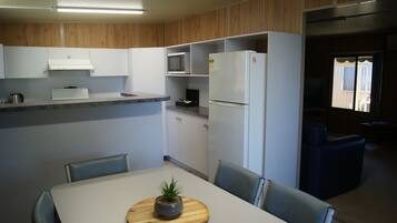 Cottage, Multiple Beds, Non Smoking | Private kitchen | Full-size fridge, microwave, oven, stovetop