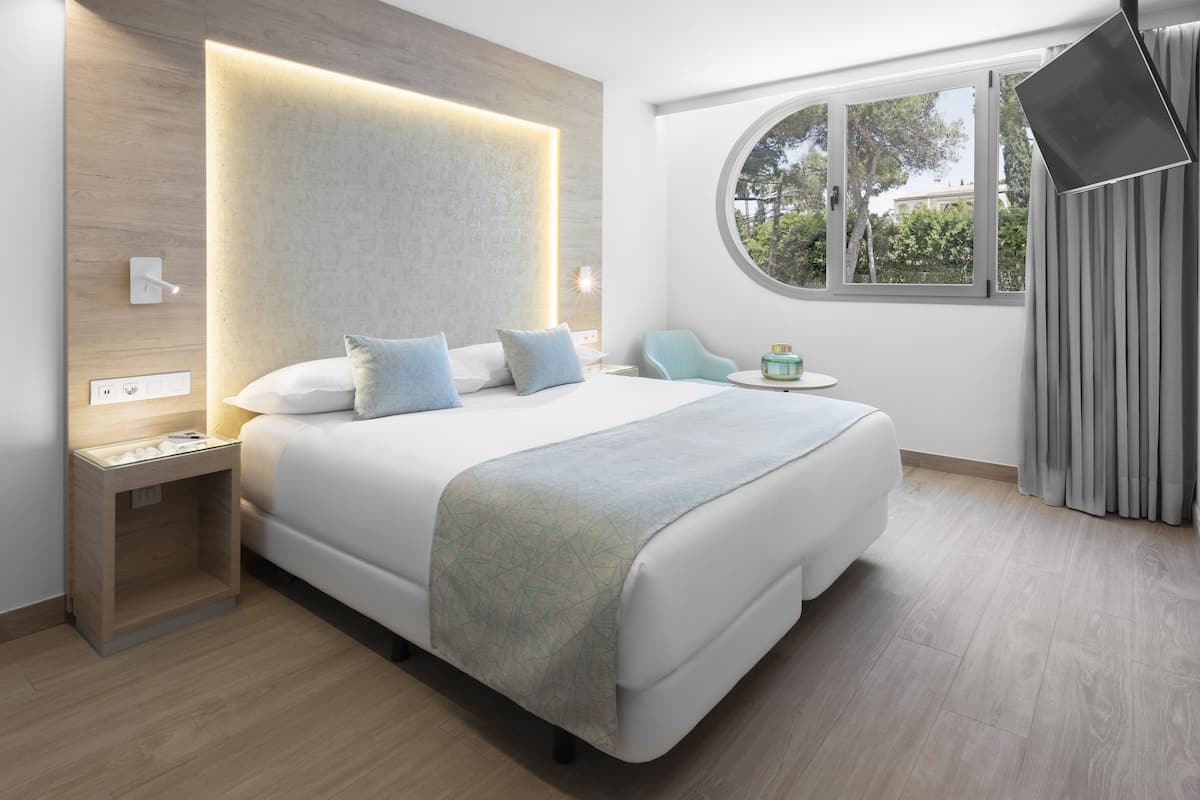 Ropa de cama de alta calidad, edredón y minibar