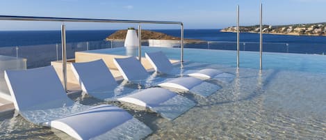 2 outdoor pools, pool umbrellas, sun loungers