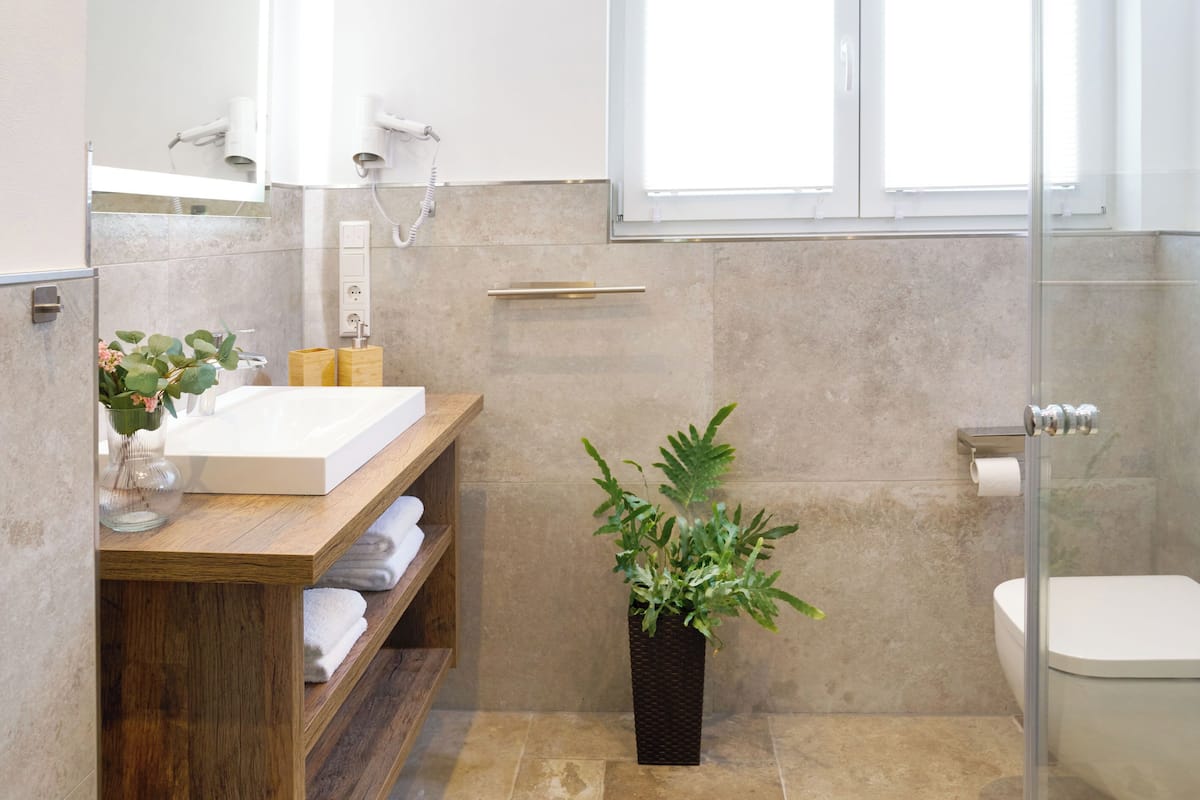 junior apartment | bathroom | shower, free toiletries, hair dryer, bathrobes