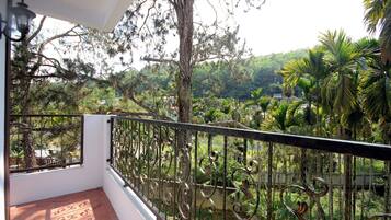 Deluxe Quadruple Room, 2 Double Beds, Non Smoking | Balcony