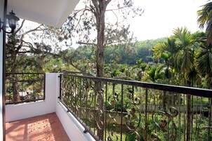 Deluxe Quadruple Room, 2 Double Beds, Non Smoking | Balcony