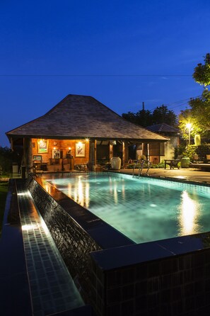 Outdoor pool, free pool cabanas, pool umbrellas