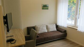 Quarto casal conforto | Escrivaninha, berços (sobretaxa), camas extras/dobráveis (sobretaxa)