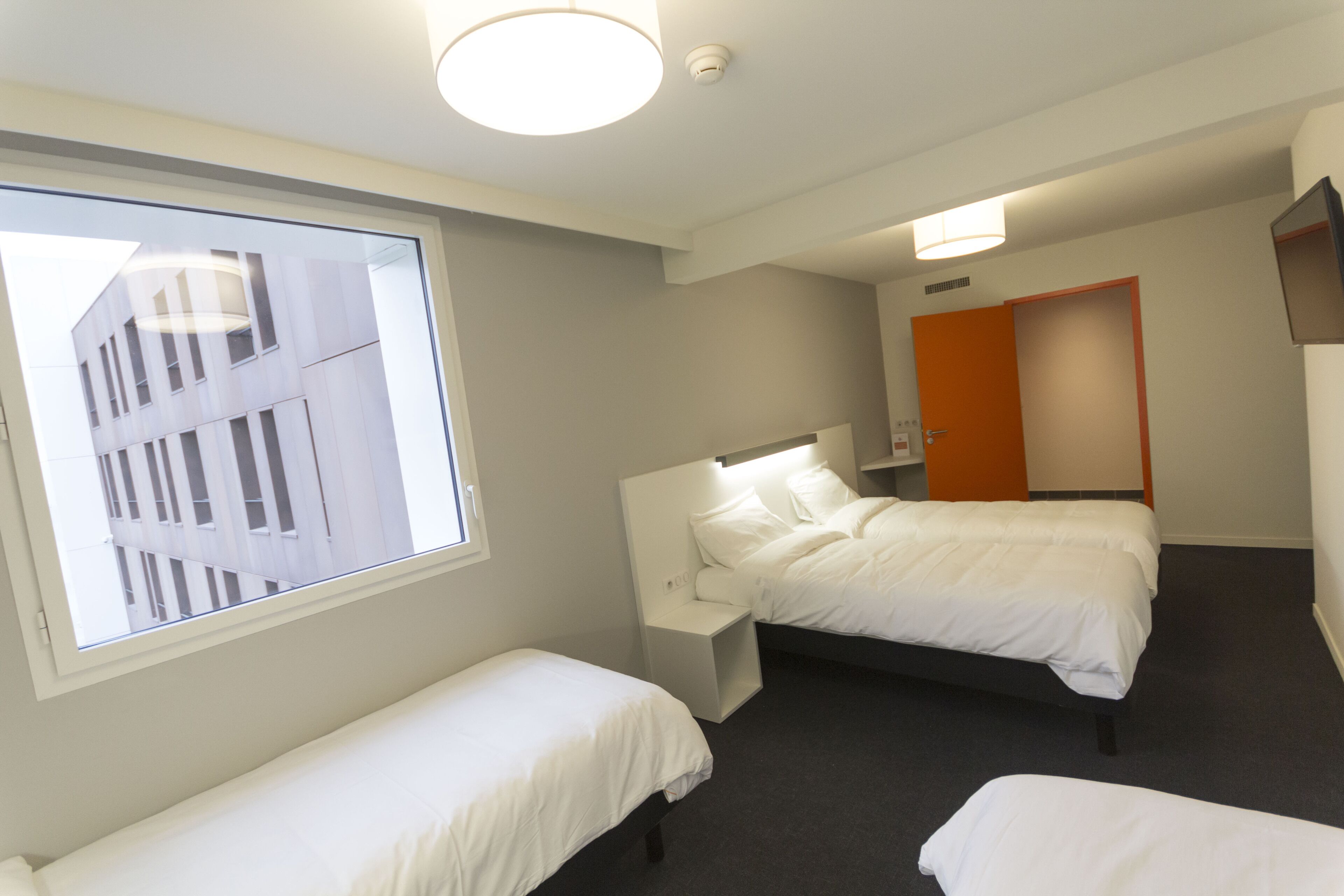 twin room | individually decorated, individually furnished, desk, blackout curtains