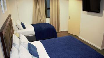 Desk, blackout curtains, free WiFi, bed sheets