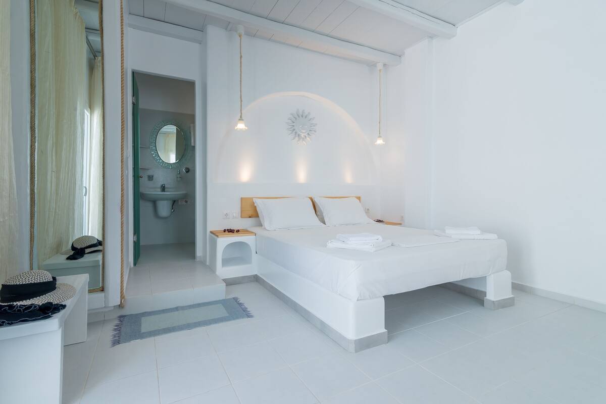 Comfort Double Room, Partial Sea View | In-room safe, iron/ironing board (on request), WiFi (free), bed sheets