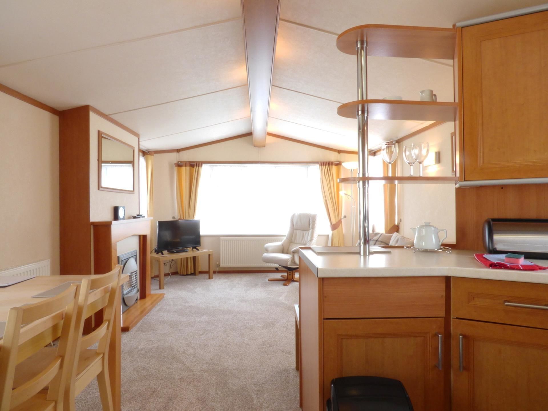 Mobile Home (Cedar Lake 76) | Living area | Flat-screen TV