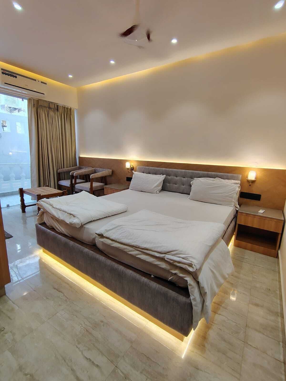 Premium Room | Lit avec matelas à plateau-coussin, articles de minibar gratuits