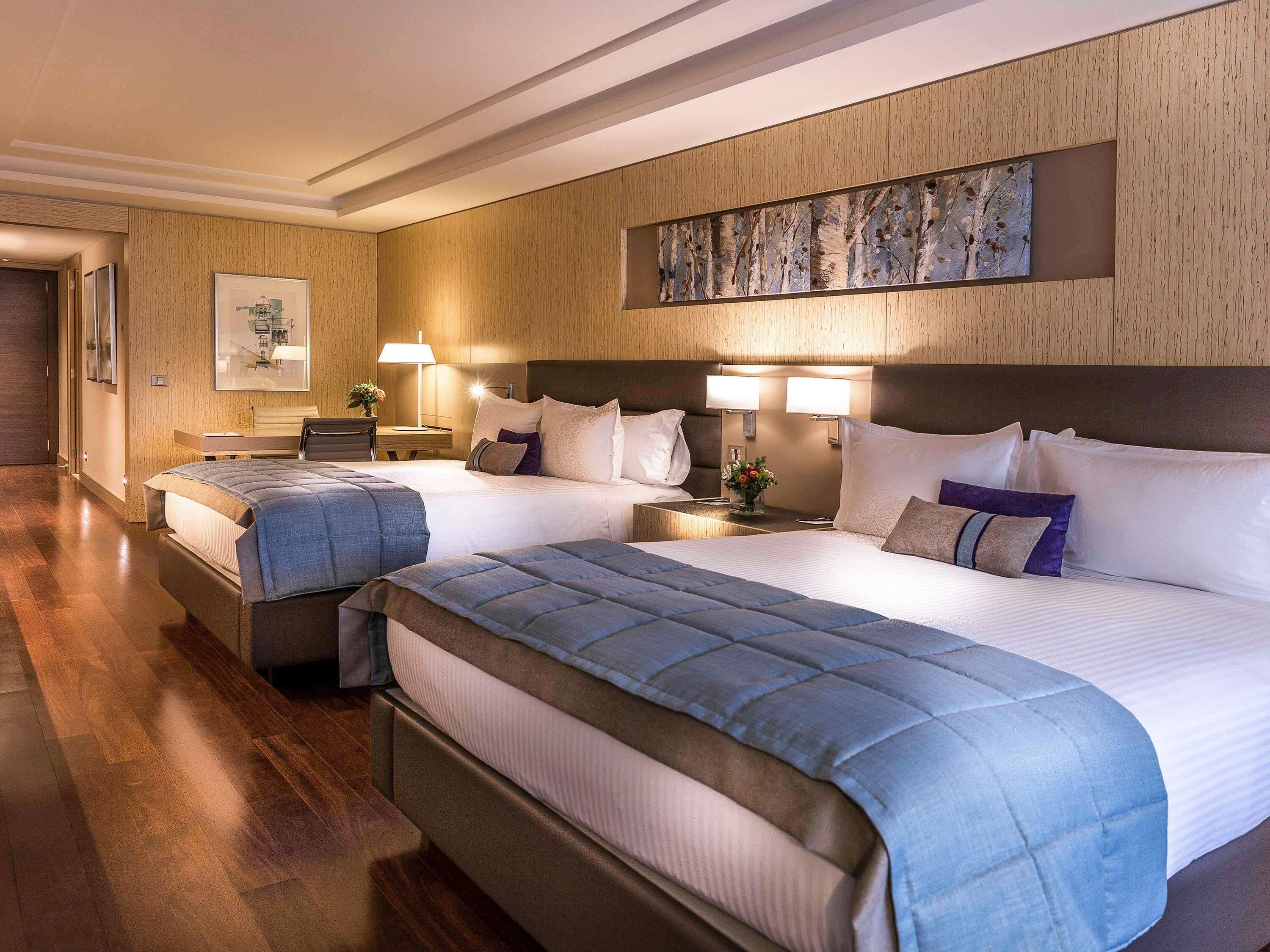 Egyptian cotton sheets, premium bedding, down duvets, minibar