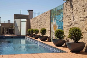 Outdoor pool, open 9:00 AM to 9:00 PM, sun loungers, lifeguards on site