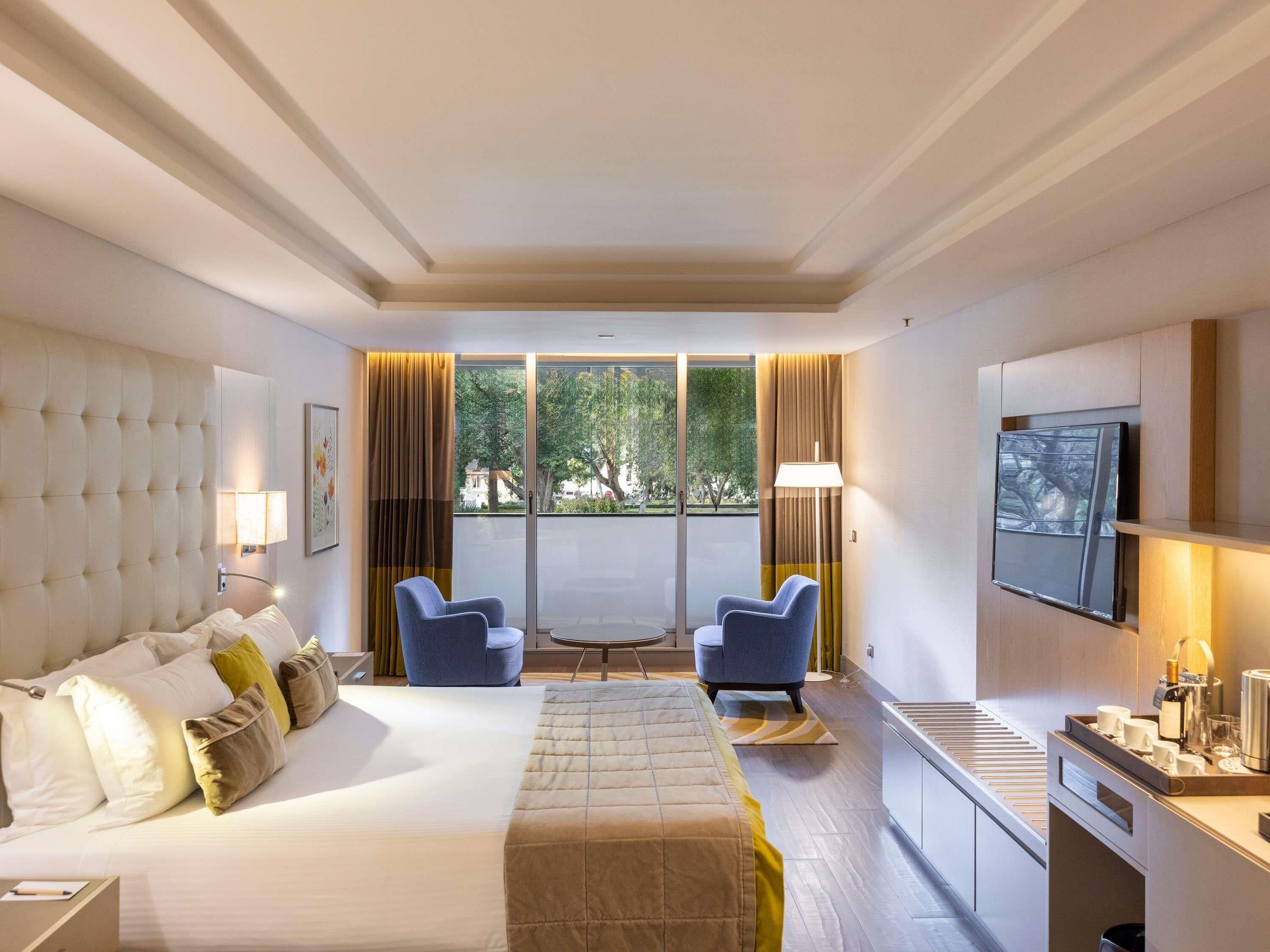 Suite Deluxe, 1 cama doble, accesible para personas con discapacidad, vistas al parque | Sábanas de algodón egipcio y ropa de cama de alta calidad