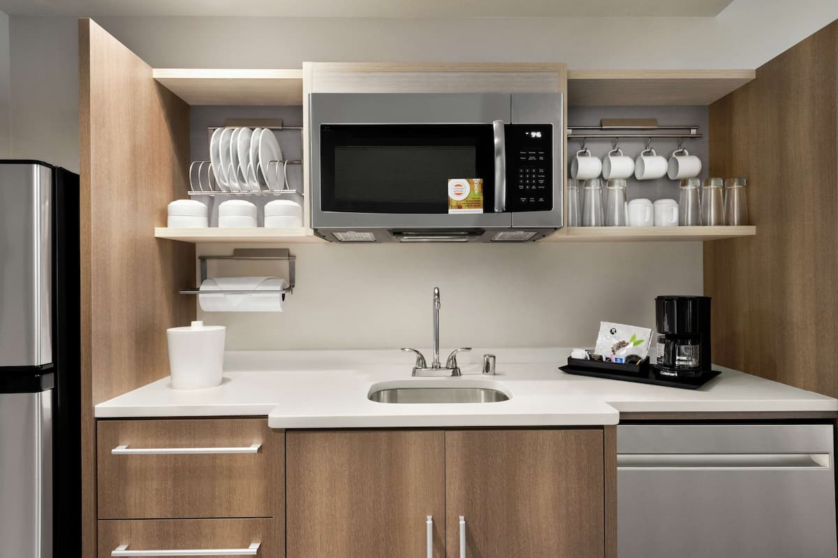 Full-sized fridge, microwave, dishwasher, coffee/tea maker