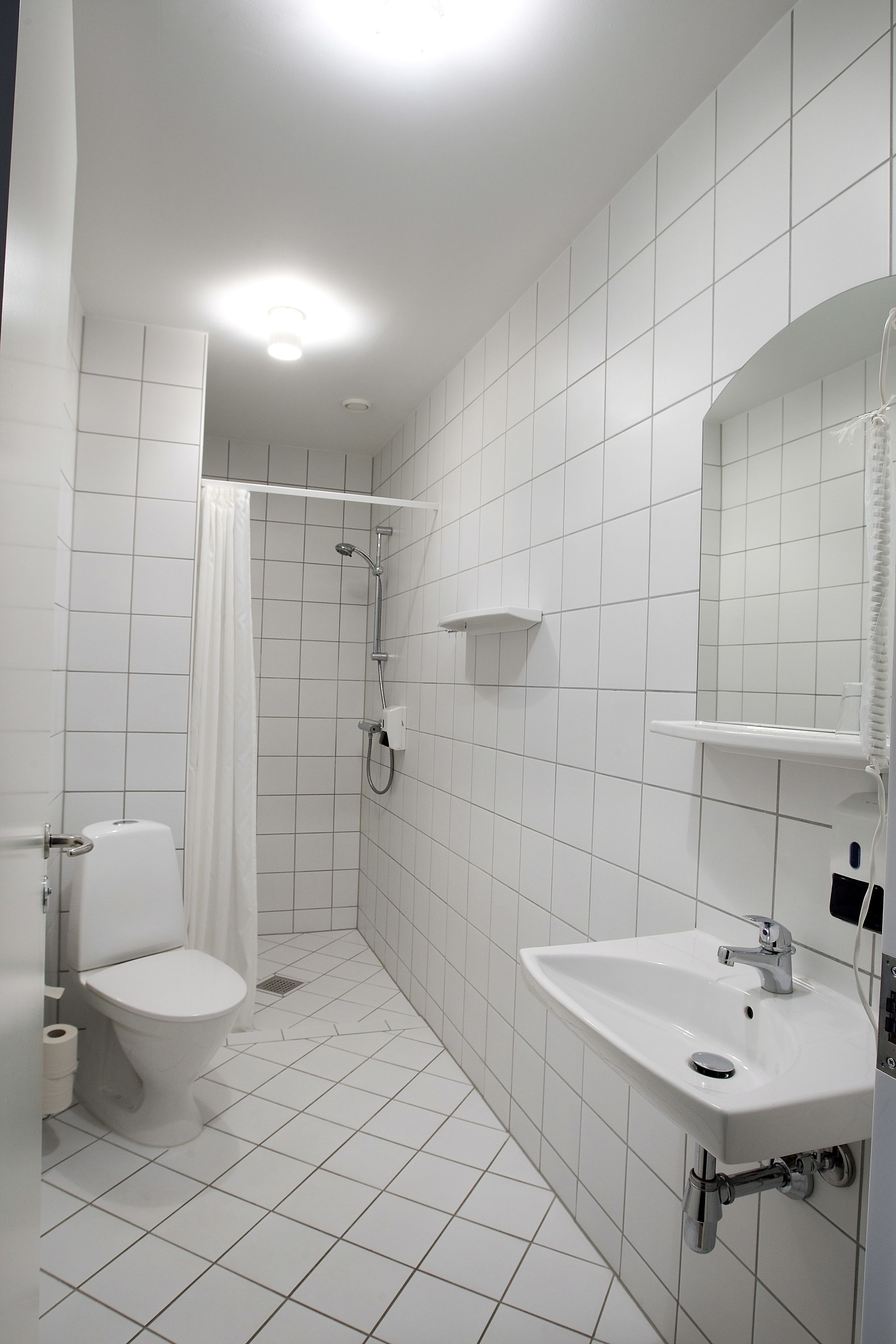 shower, free toiletries, hair dryer, slippers