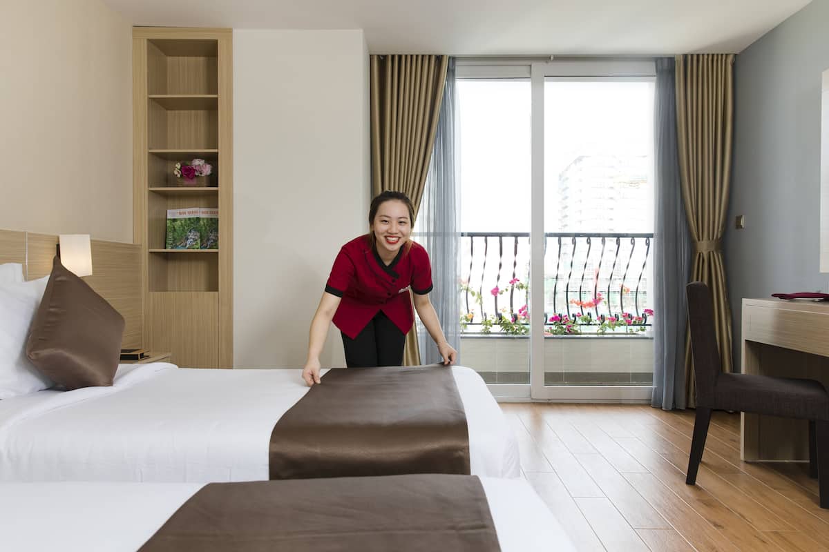 Deluxe Double or Twin Room, Balcony, City View | Minibar, in-room safe, desk, iron/ironing board