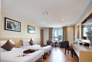 Deluxe Double or Twin Room, Balcony, City View | Minibar, in-room safe, desk, iron/ironing board