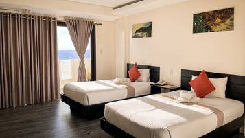 Deluxe Double or Twin Room, 2 Double Beds, Ocean View | Desk, soundproofing, free WiFi, bed sheets