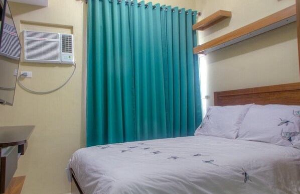 1 غرفة نوم ومكواة/لوح كي وواي فاي وملاءات أسرّة