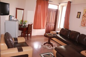 Suite | Woonkamer | Flatscreentelevisie