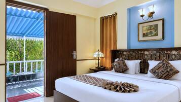 Premium Double Room, Garden View | 1 bedroom, premium bedding, in-room safe