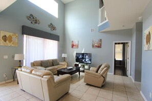 Télévision, jeux vidéo, lecteur de DVD, table de tennis de table