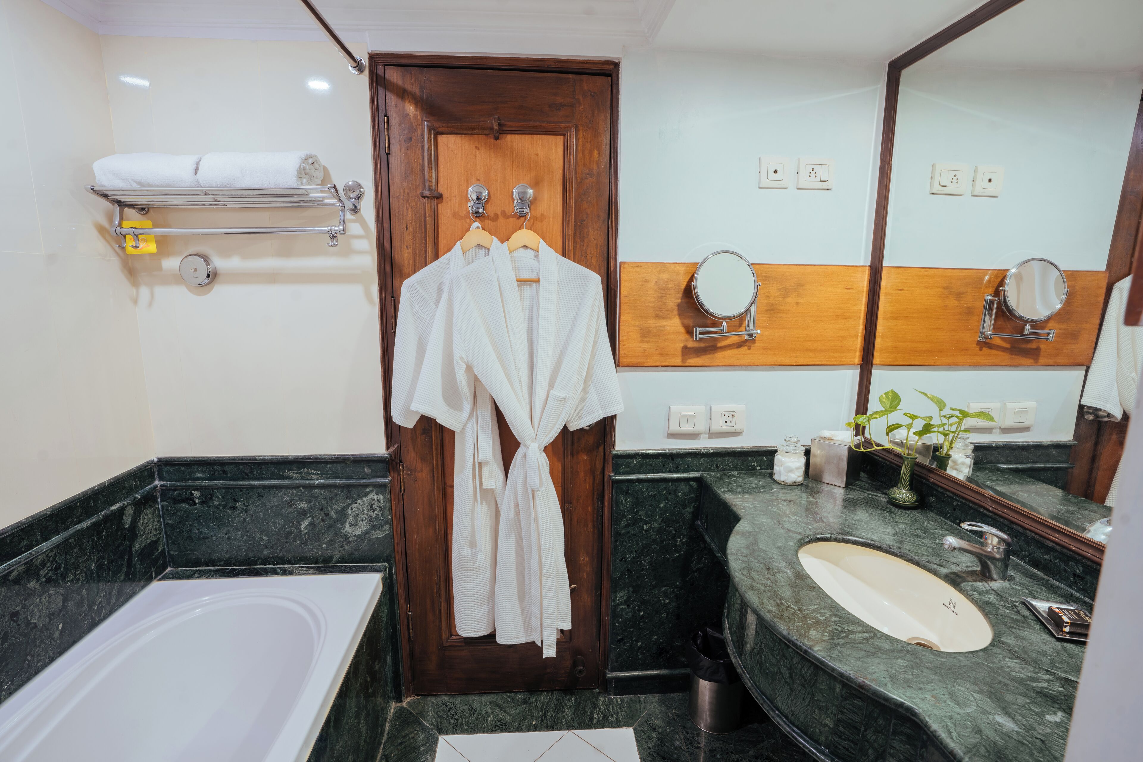 bathtub, slippers, towels