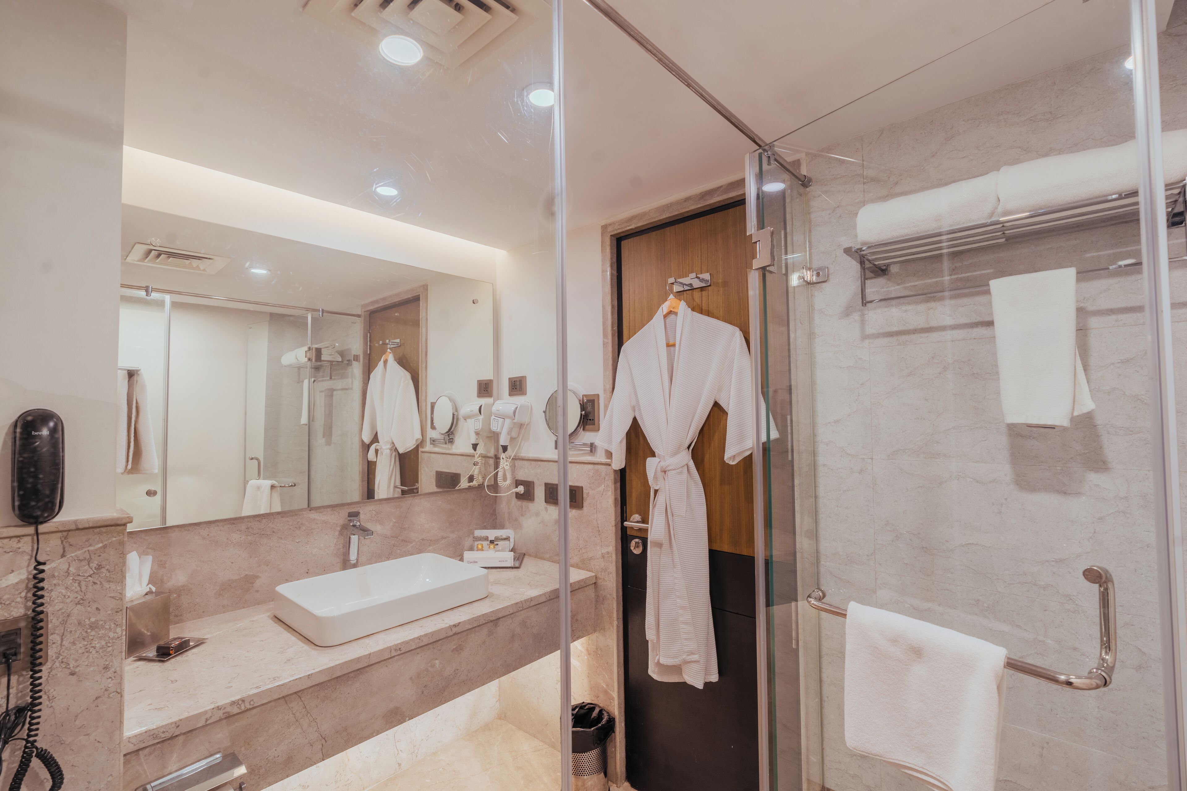 luxury room | bathroom | bathtub, slippers, towels