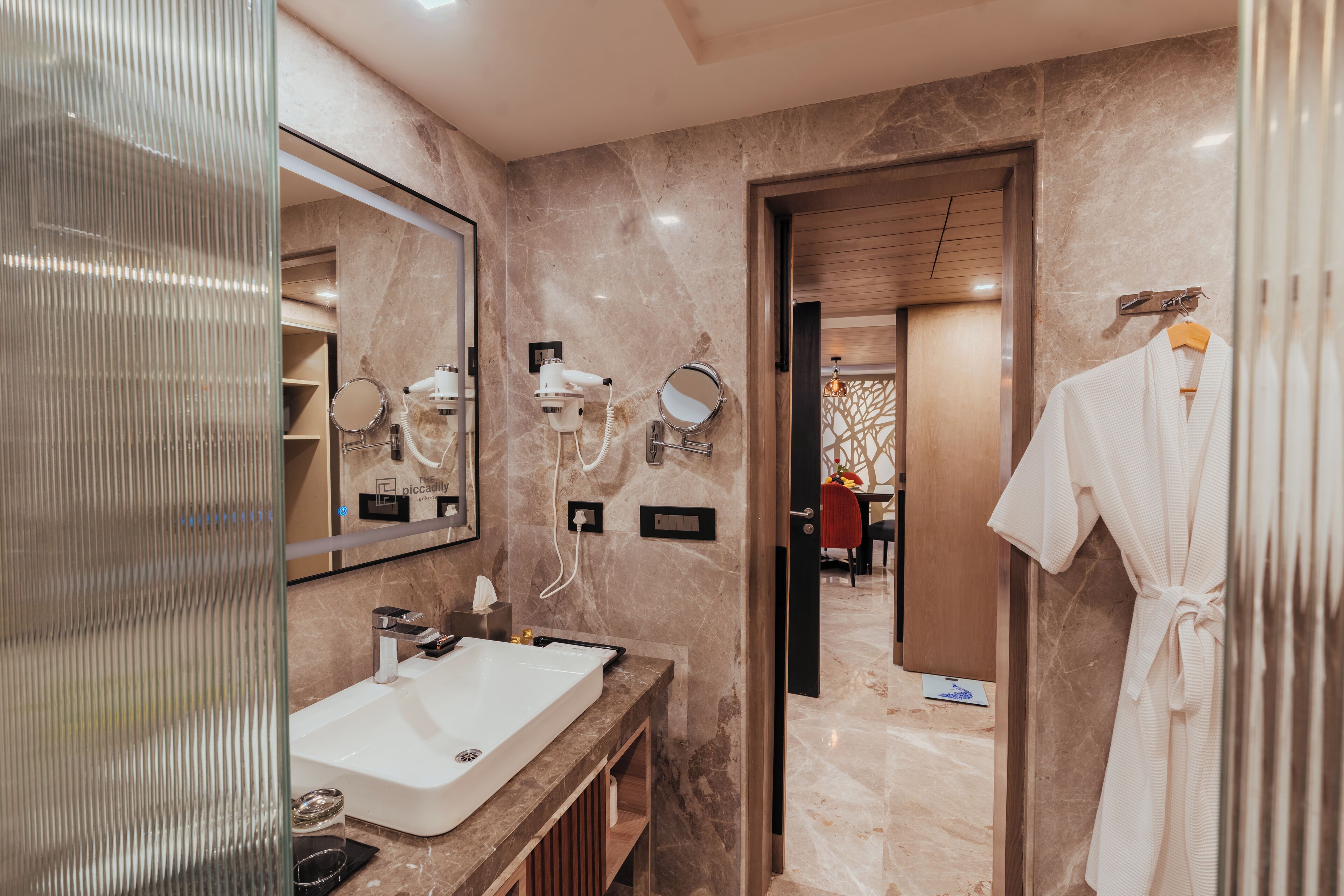 luxury suite | bathroom | bathtub, slippers, towels