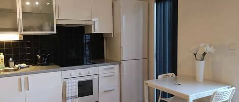 Apartment | Private kitchen | Full-size fridge, microwave, oven, stovetop