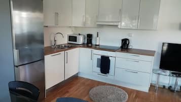 Apartament urbà, 1 dormitori | Cuina privada | Frigorífic gran, microones, forn i placa de cuina