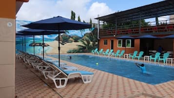 Outdoor pool, pool umbrellas, pool loungers