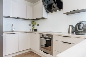 Appartement Exclusif | Cuisine privée | Réfrigérateur, micro-ondes, plaque de cuisson, lave-vaisselle