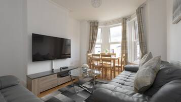 House, 4 Bedrooms | Living area | Flat-screen TV
