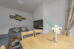 House, 4 Bedrooms | Living area | Flat-screen TV