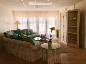 Family House, 4 Bedrooms, Sea View | Living room | Flat-screen TV, Netflix - Bey Blue by Living Easy Abaco (Marsh Harbour)