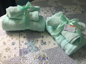 Shower, bathrobes, towels
