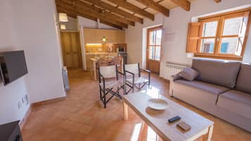 Superior Apartment, 1 Bedroom, Terrace | Living room | Flat-screen TV, fireplace