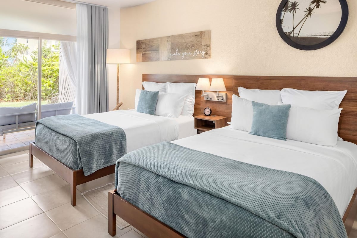 Room, 2 Queen Beds, Garden View (Playa Collection) | Premium bedding, pillowtop beds, in-room safe, individually furnished
